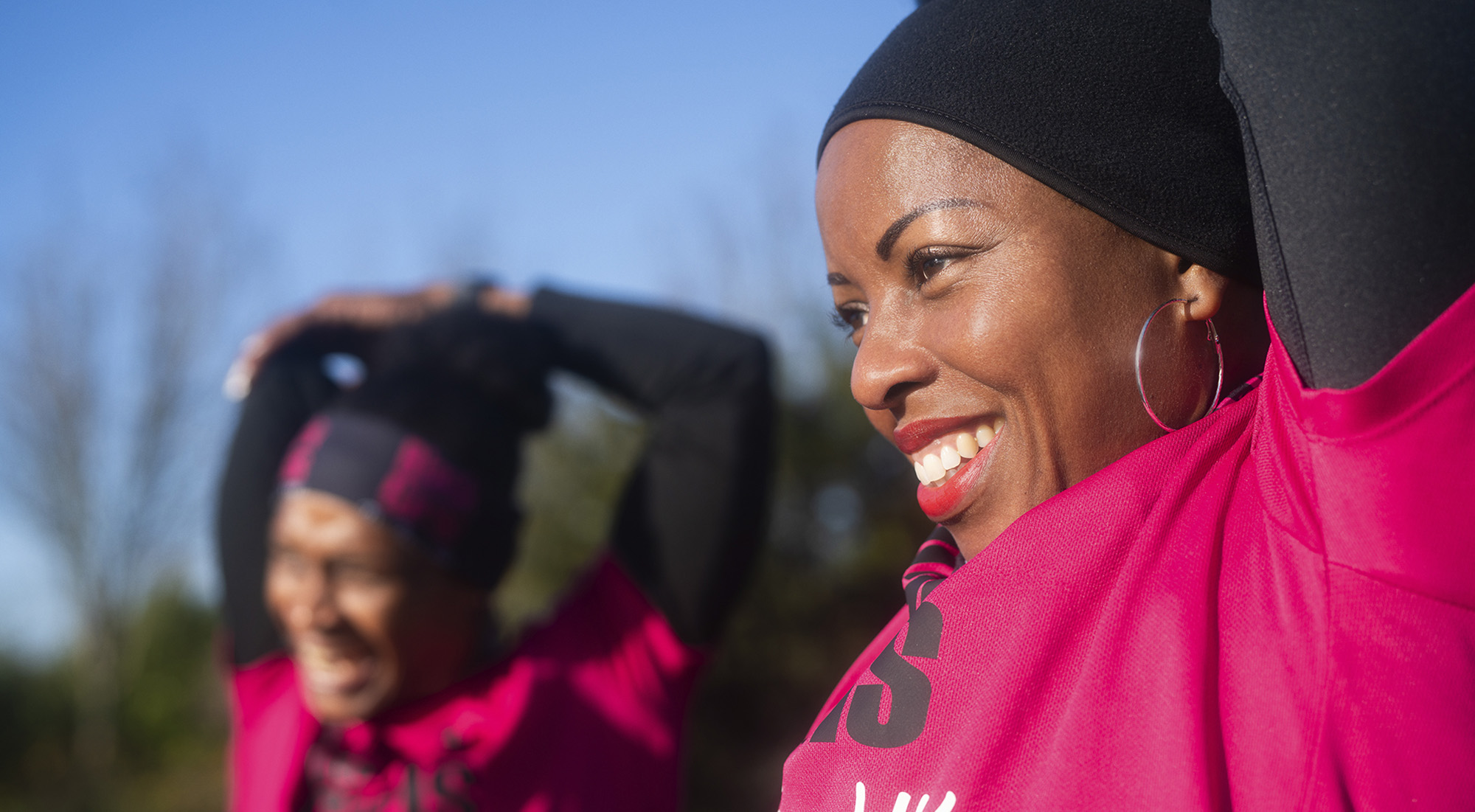 Women stretch before going for a run