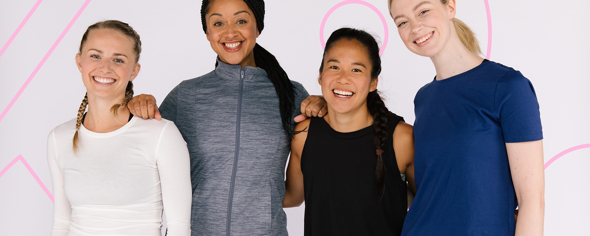 Studio You instructors posing for a group picture