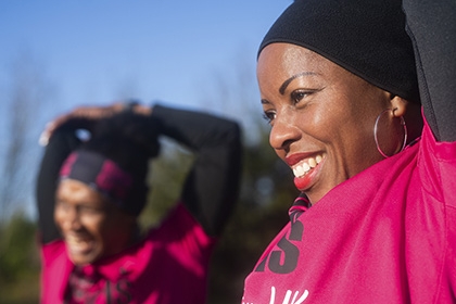 Women stretch before going for a run