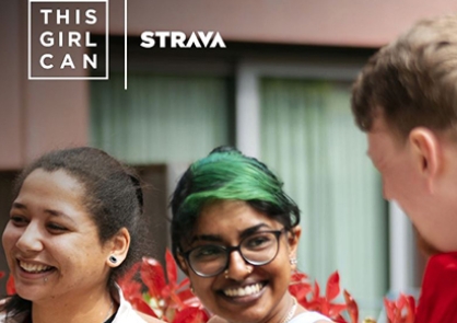 A picture of three smiling people, with the This Girl Can and Strava logos on